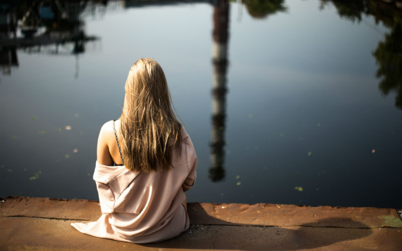 Woman Looking Water